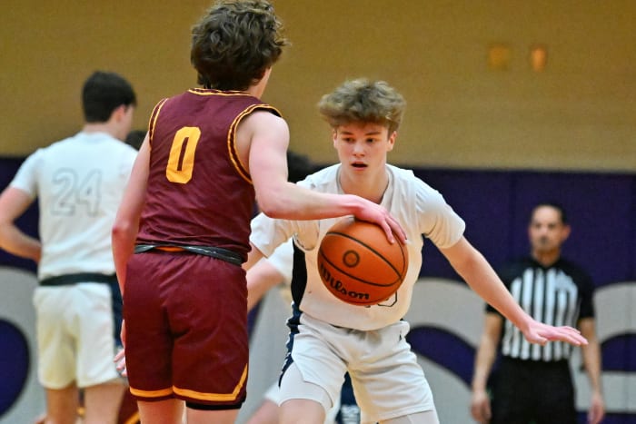 a Wilsonville Redmond 5A Oregon boys basketball quarterfinal 2024 Leon Neuschwander 9